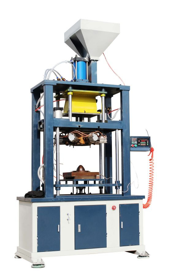 Machine à noyaux pour boîtes chaudes à injection par le haut